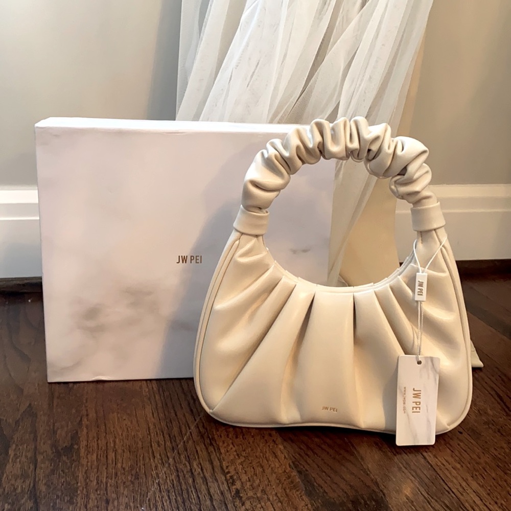 Brand new cream purse